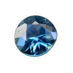 Face-up view of a 0.59 carat natural teal round sapphire from Madagascar