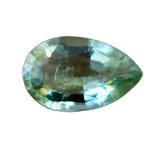 Face-up view of a 0.51 carat natural green sapphire with an elongated pear cut.