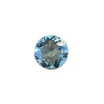 Face-up view of a 0.63 carat natural round green sapphire.