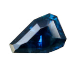 Natural blue sapphire 1.24 carat freeform cut loose gemstone from Ceylon