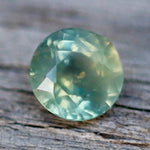 Natural Green Sapphire – 0.63 Carat Round Cut from Madagascar - Sapphirepal