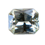 Emerald cut pale yellow sapphire close-up showing faceted gemstones and soft golden tone