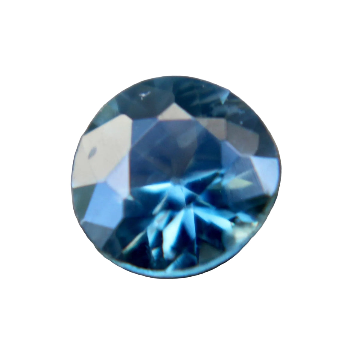 Face-up view of a 0.59 carat natural teal round sapphire from Madagascar