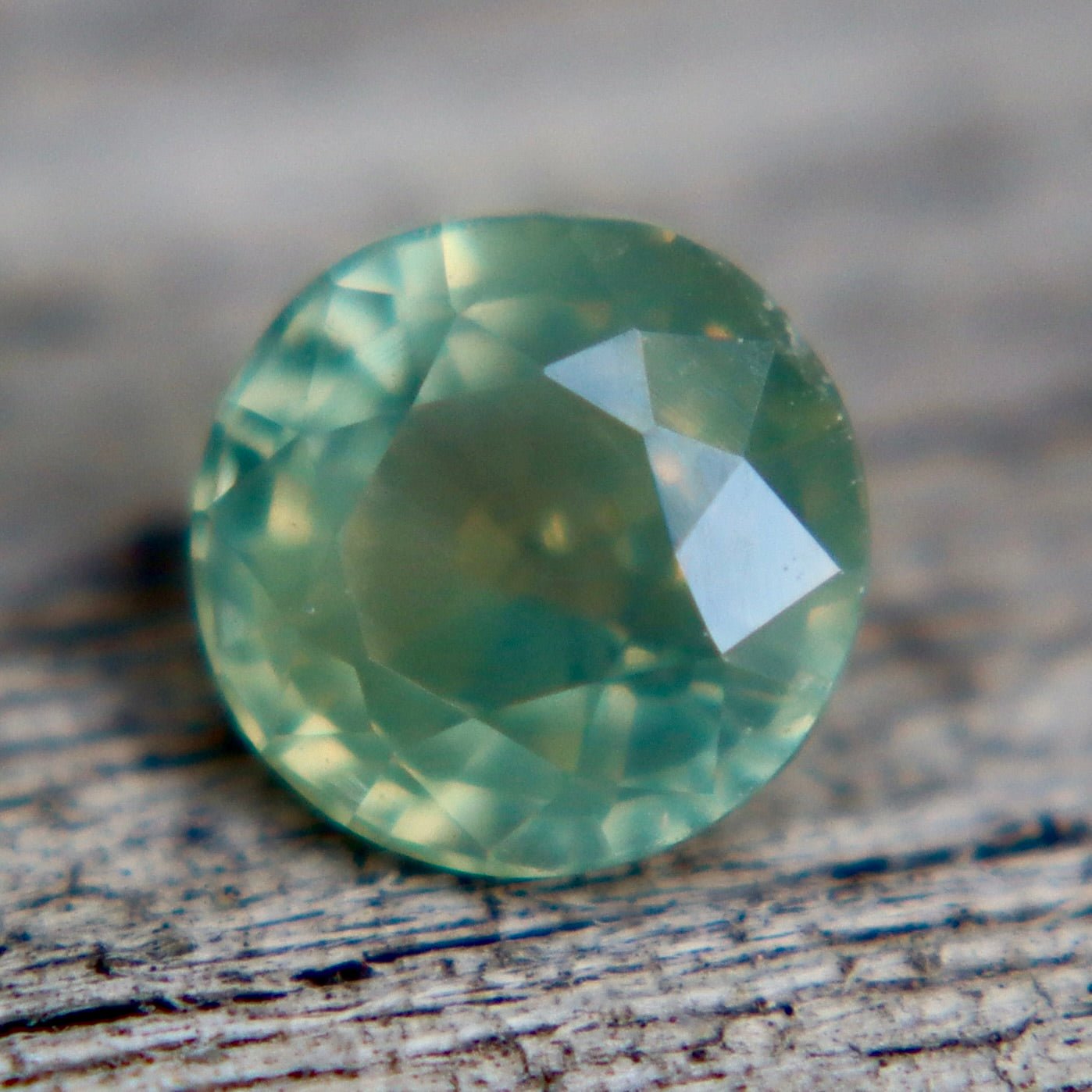 0.58 Carat Natural Green Yellow Parti Sapphire – Unheated Madagascar Round Cut VS Loose Sapphire (Authenticity Confirmed) - Sapphirepal