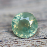 0.58 Carat Natural Green Yellow Parti Sapphire – Unheated Madagascar Round Cut VS Loose Sapphire (Authenticity Confirmed) - Sapphirepal