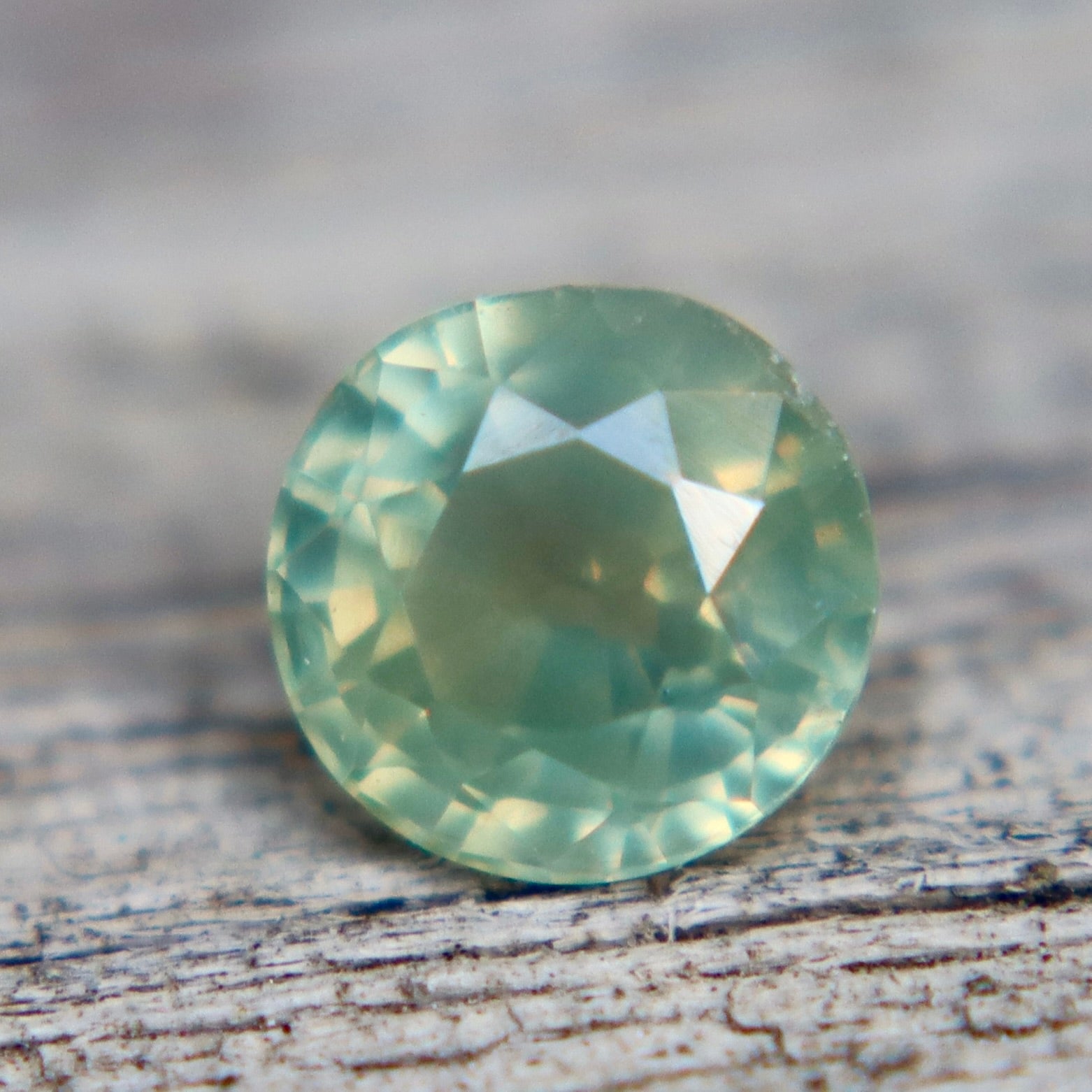 0.58 Carat Natural Green Yellow Parti Sapphire – Unheated Madagascar Round Cut VS Loose Sapphire (Authenticity Confirmed) - Sapphirepal