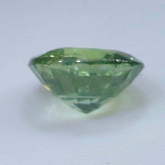0.70 Carat Natural Green Sapphire (Australia) — Unheated & Untreated, Eye Clean, Round Cut | Sapphire Pal - Sapphirepal