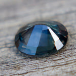 0.80 Carat Natural Unheated Parti Sapphire from Ceylon (Round Cut, VS) - Sapphirepal