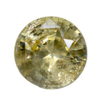 Face-up view of 1.29ct pale yellow Ceylon sapphire with round cut and visible natural inclusions