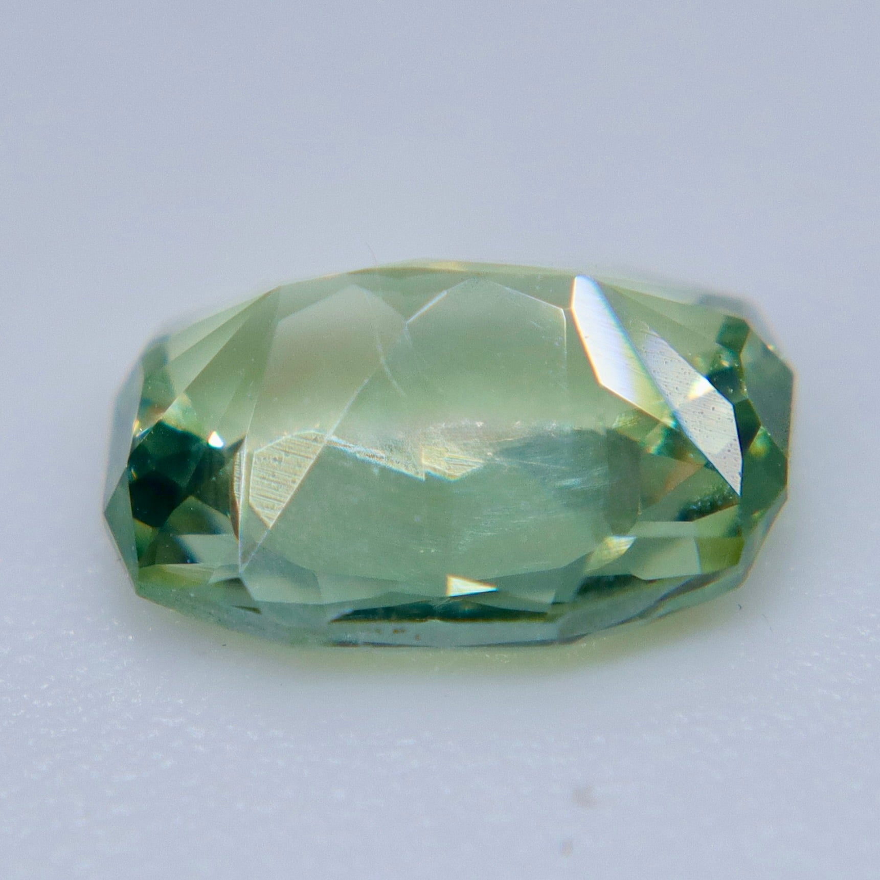 Back view of untreated Ceylon alexandrite showing geometric pavilion facets