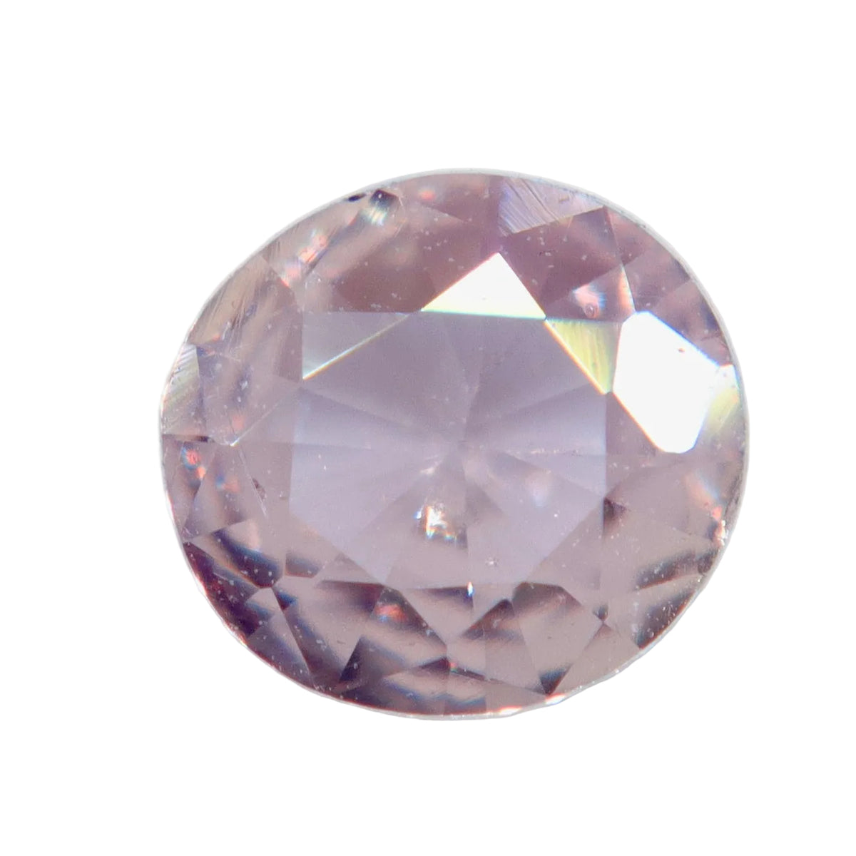 Face-up view of a 0.41 ct peach-pink sapphire with a roundish oval outline and visible inclusions