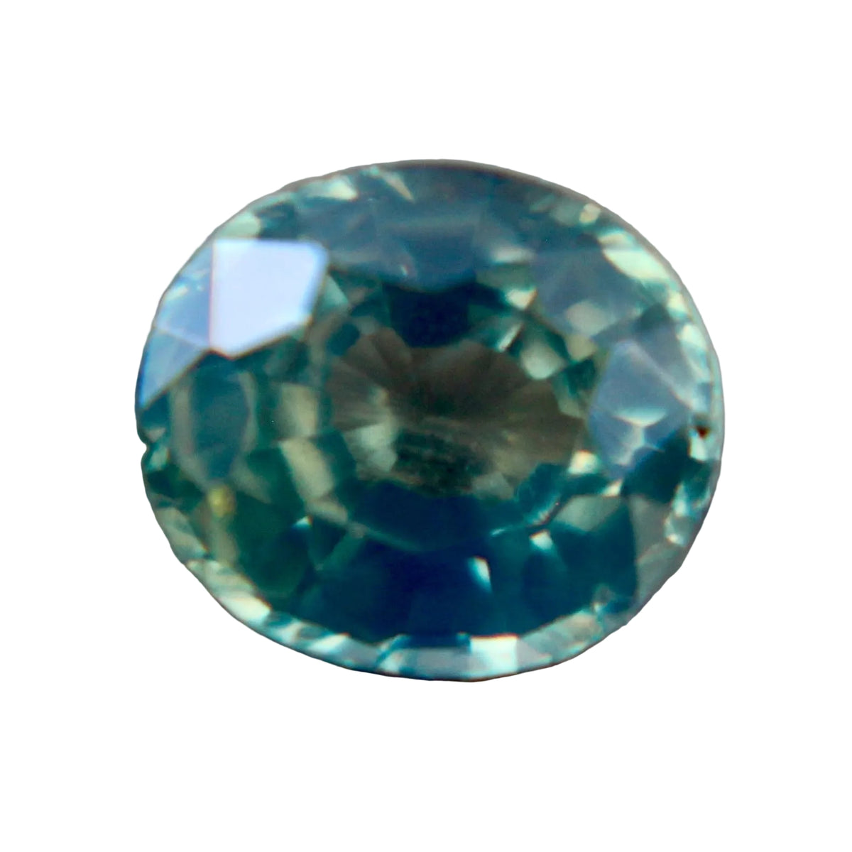 Face-up view of a 0.61 carat natural green oval sapphire.