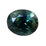 Face-up view of a 0.66 carat natural green oval sapphire.