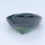 Heart-cut Australian green sapphire with VVS clarity and faceted crown