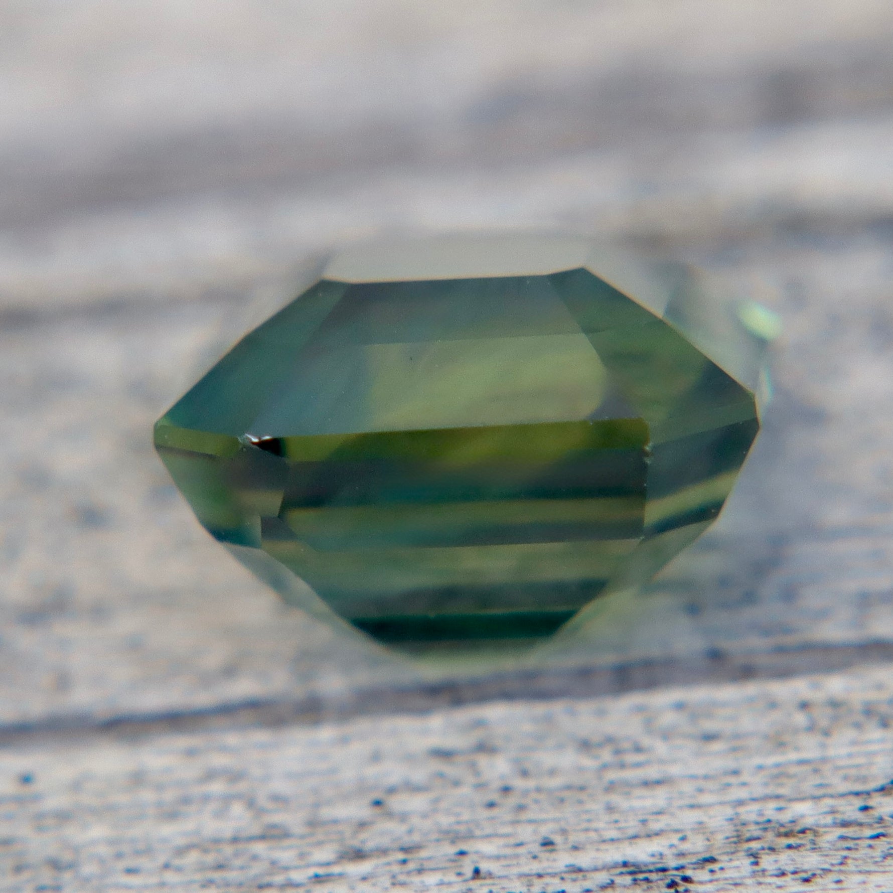 Emerald cut Ceylon sapphire stone earth sourced gemstone authenticity confirmed