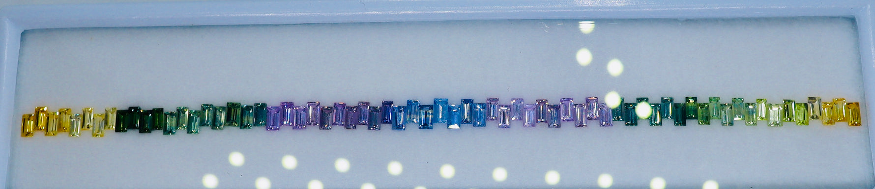 Luxury rainbow sapphire strip with yellow green blue purple tones for bespoke jewelry
