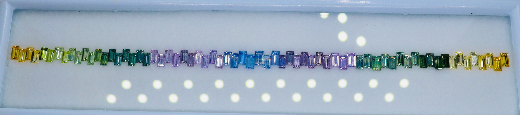 Ceylon rainbow sapphire loose gemstone set with baguette cut faceted stones