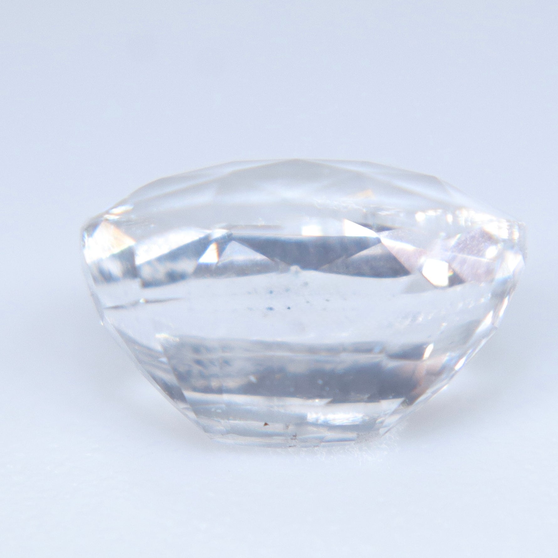 Cushion cut natural white sapphire from Ceylon for engagement ring design