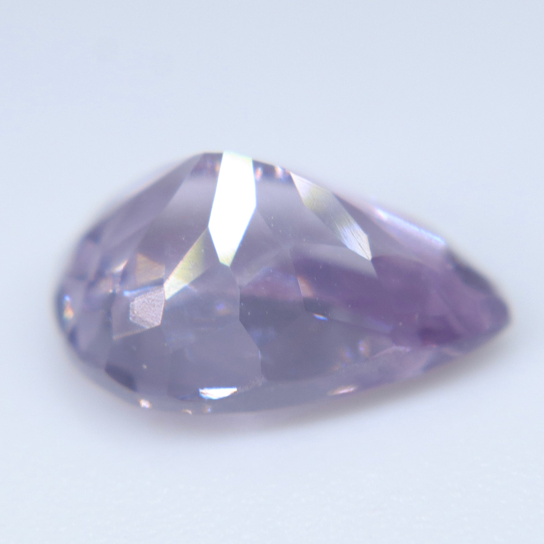 Ceylon natural purple spinel loose gemstone with violet color and faceted pear cut