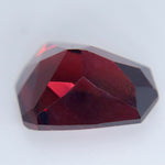 5.98 carat natural red garnet gemstone in modified shield cut with VVS clarity