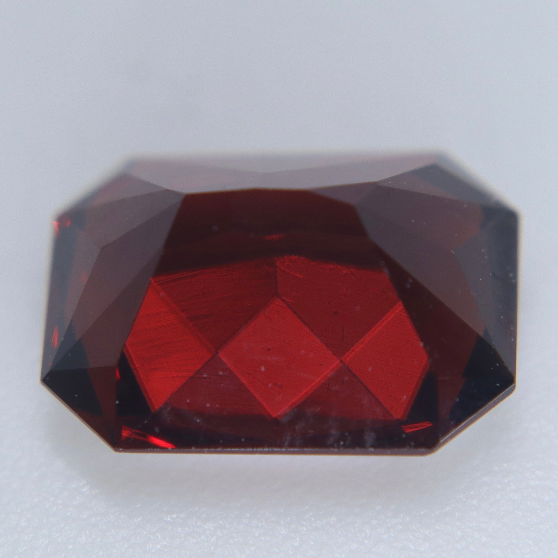 4.56 carat emerald cut natural garnet gemstone for bespoke jewelry design