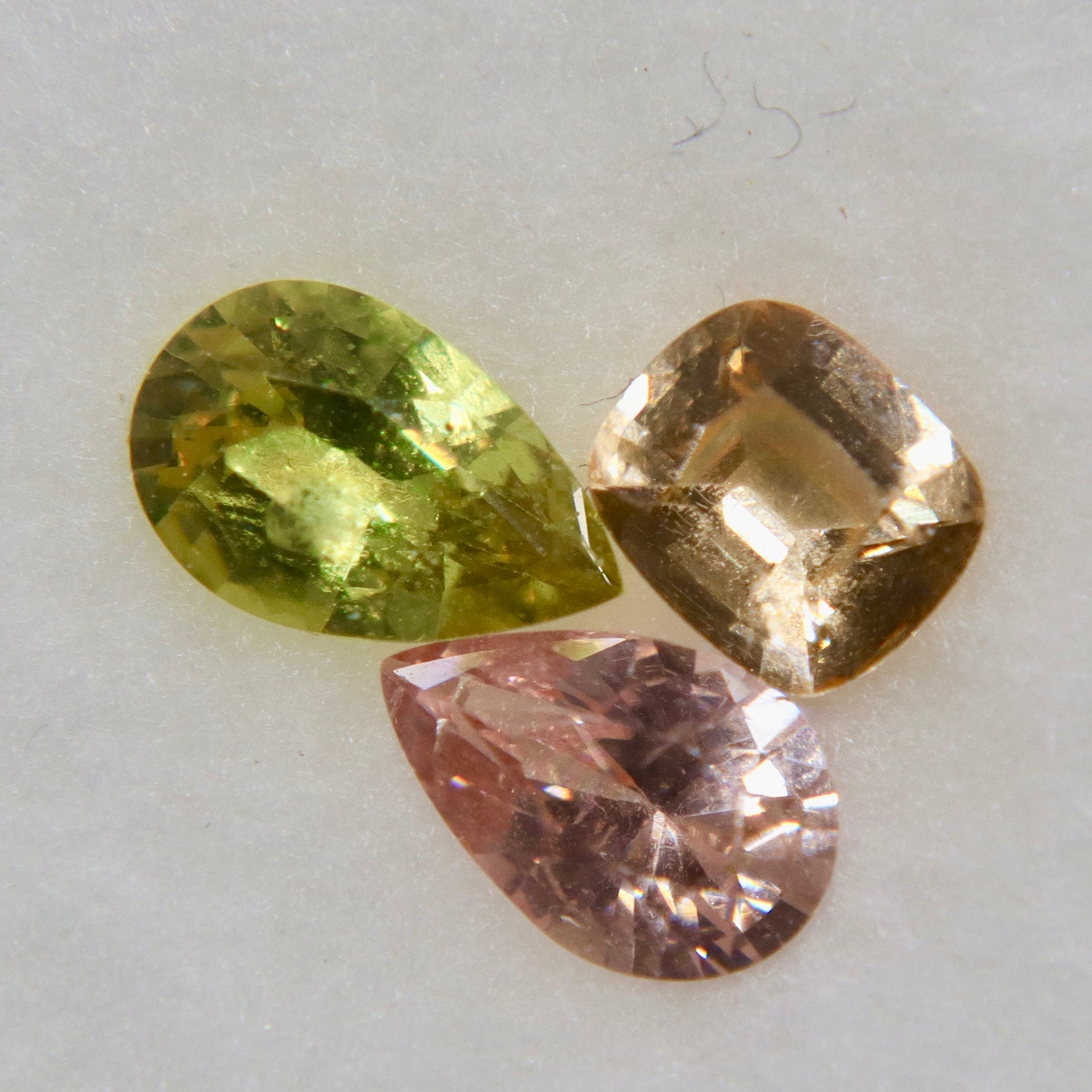Natural 0.33 carat Padparadscha pear-cut Ceylon sapphire in a delicate pink-orange color