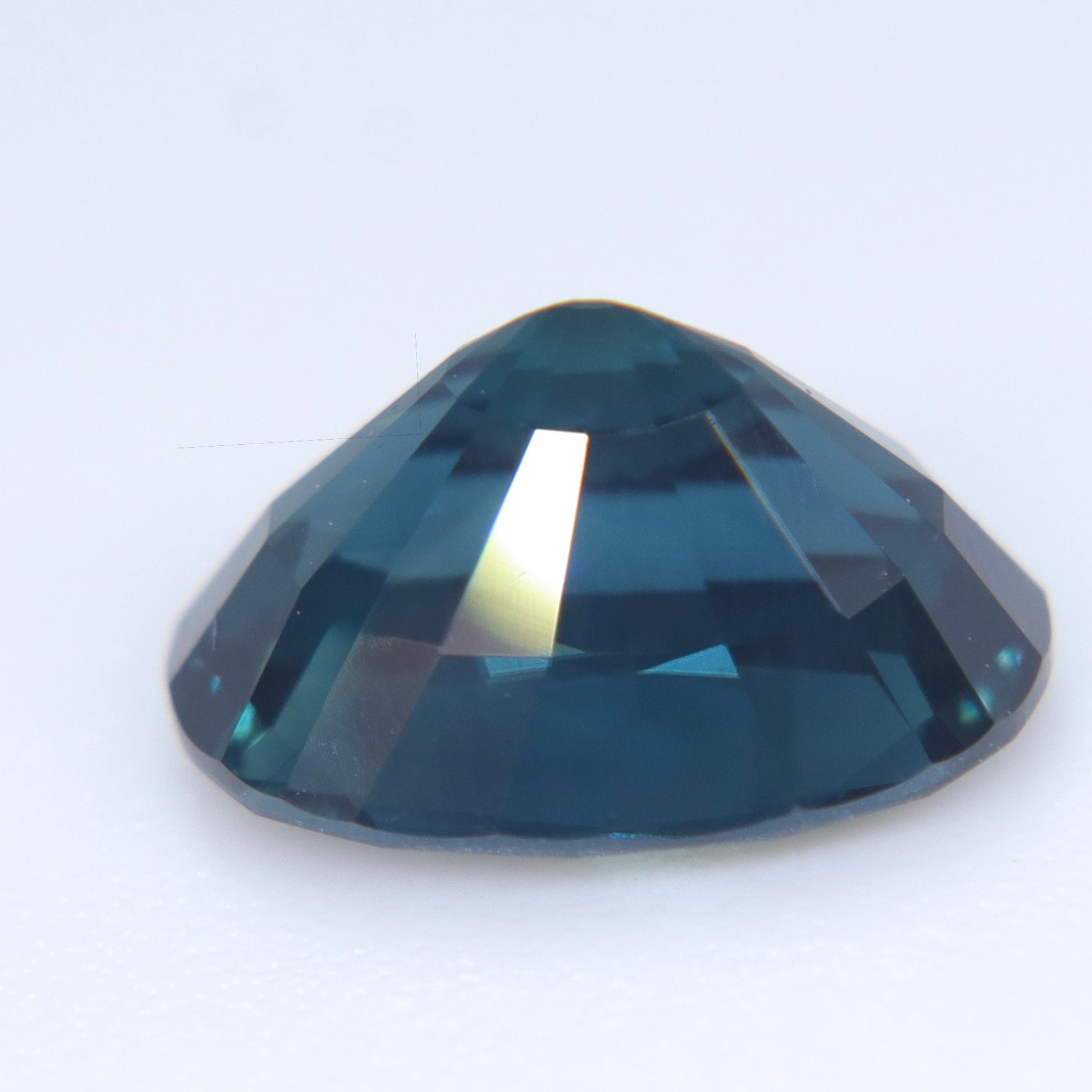 Natural Australian sapphire 8.97mm oval cut deep blue green color