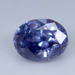 Natural Ceylon purple sapphire viewed face-up with lavender and blue-violet reflections