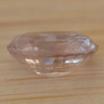 Oval Ceylon sapphire showing natural inclusions and faceting
