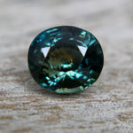 Side profile of the oval Madagascar sapphire showing its 4.10 mm depth