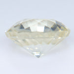 Side view of 1.34 carat natural white sapphire measuring 6.68 by 4.22 mm