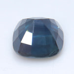Side view of Australian cushion cut sapphire showing its depth