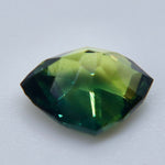 Unheated Australian sapphire showing deep forest green and teal color zoning
