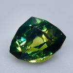 VVS loose green parti sapphire with olive, teal, and blue-green flashes