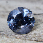 Side view of 6.33 mm natural purple spinel from Ceylon