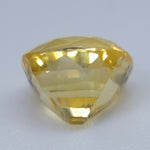 Face-up view of eye-clean 1.55 carat yellow sapphire from Ceylon