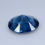 Close-up of the eye-clean oval cobalt blue spinel showing its saturated blue facets