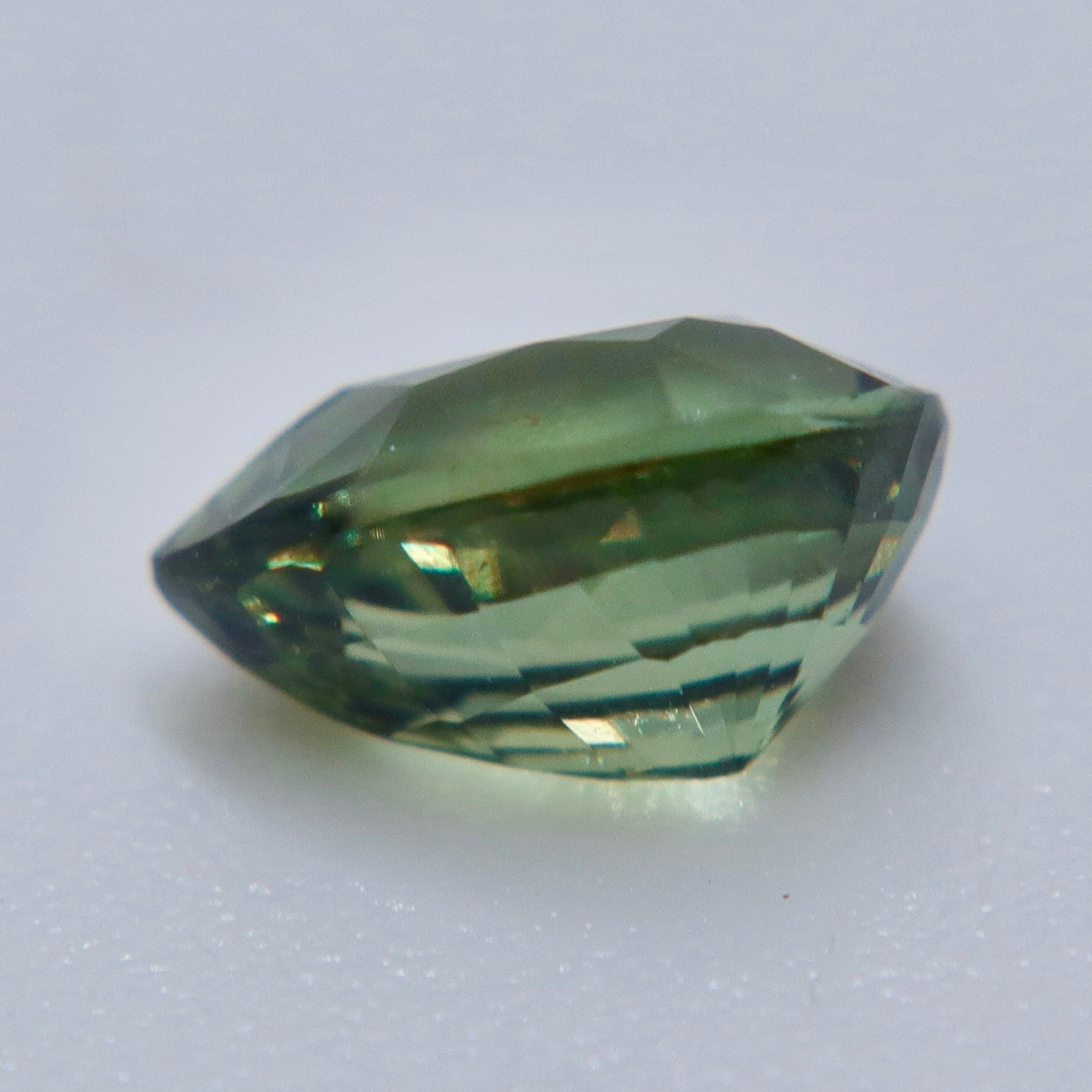 Eye-clean natural alexandrite loose gemstone with a polished pear-shaped faceted cut