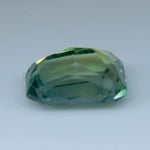 Natural green sapphire measuring 6.80 by 5.45 mm