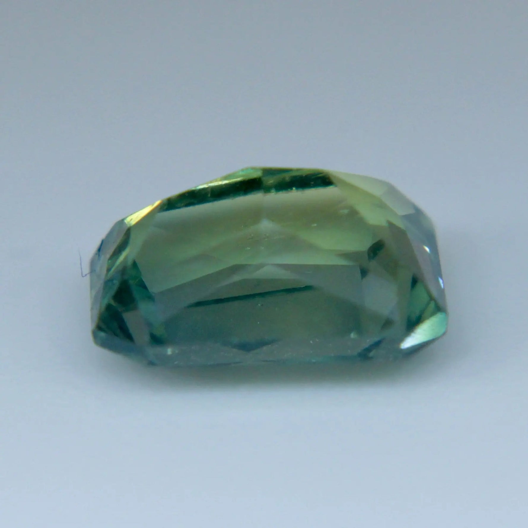 Natural green sapphire measuring 6.80 by 5.45 mm