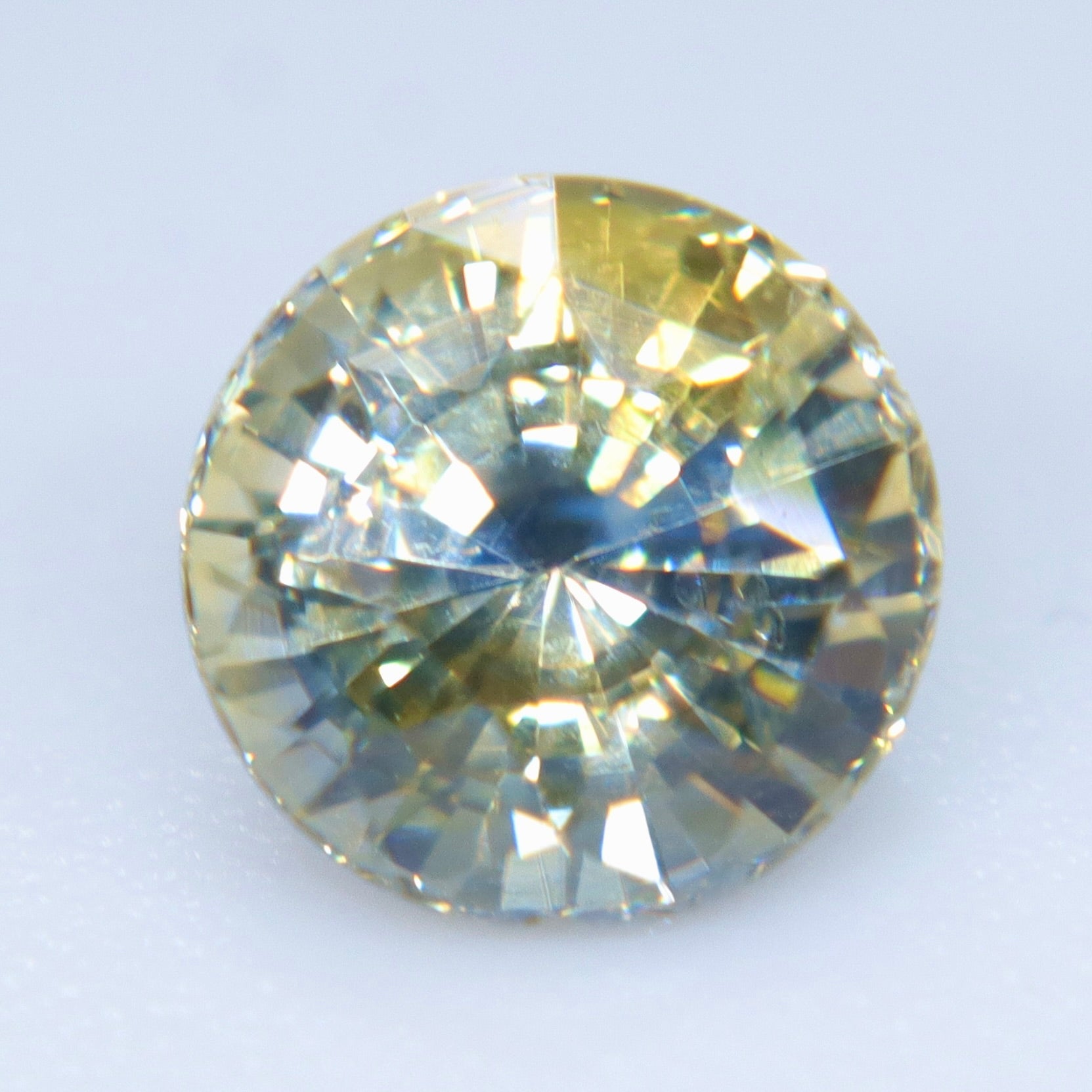 Loose heated Ceylon parti sapphire for a custom engagement ring