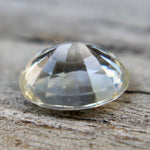 Oval yellow champagne sapphire showing lively brilliance in neutral light
