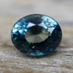 Oval cut teal sapphire gemstone for custom engagement rings