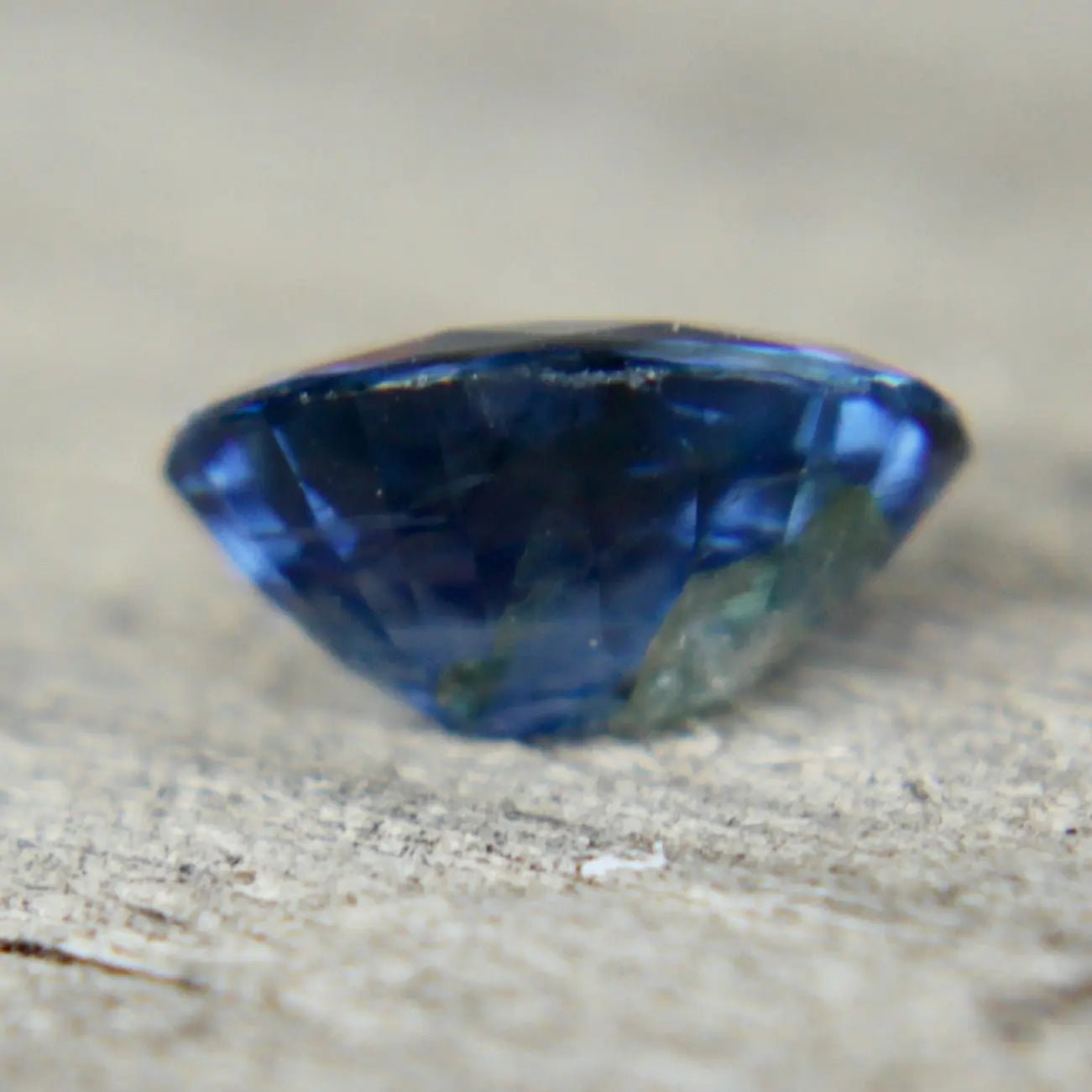 Unheated blue sapphire 6.33×4.75×3.04 mm – side profile