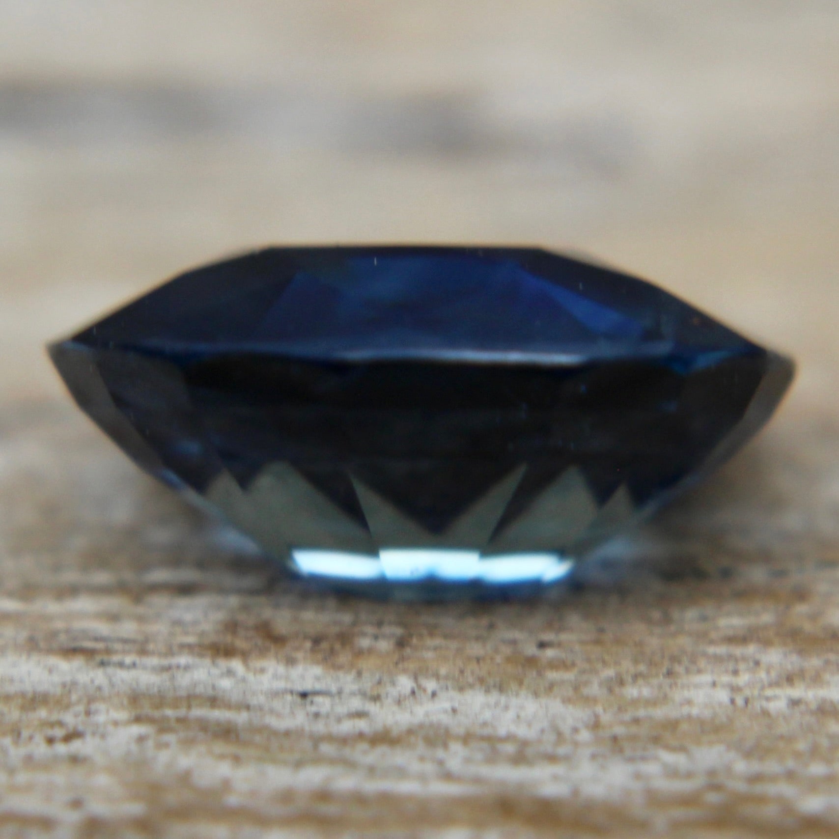 Ceylon blue sapphire measured on calipers at 7.82 × 6.00 mm