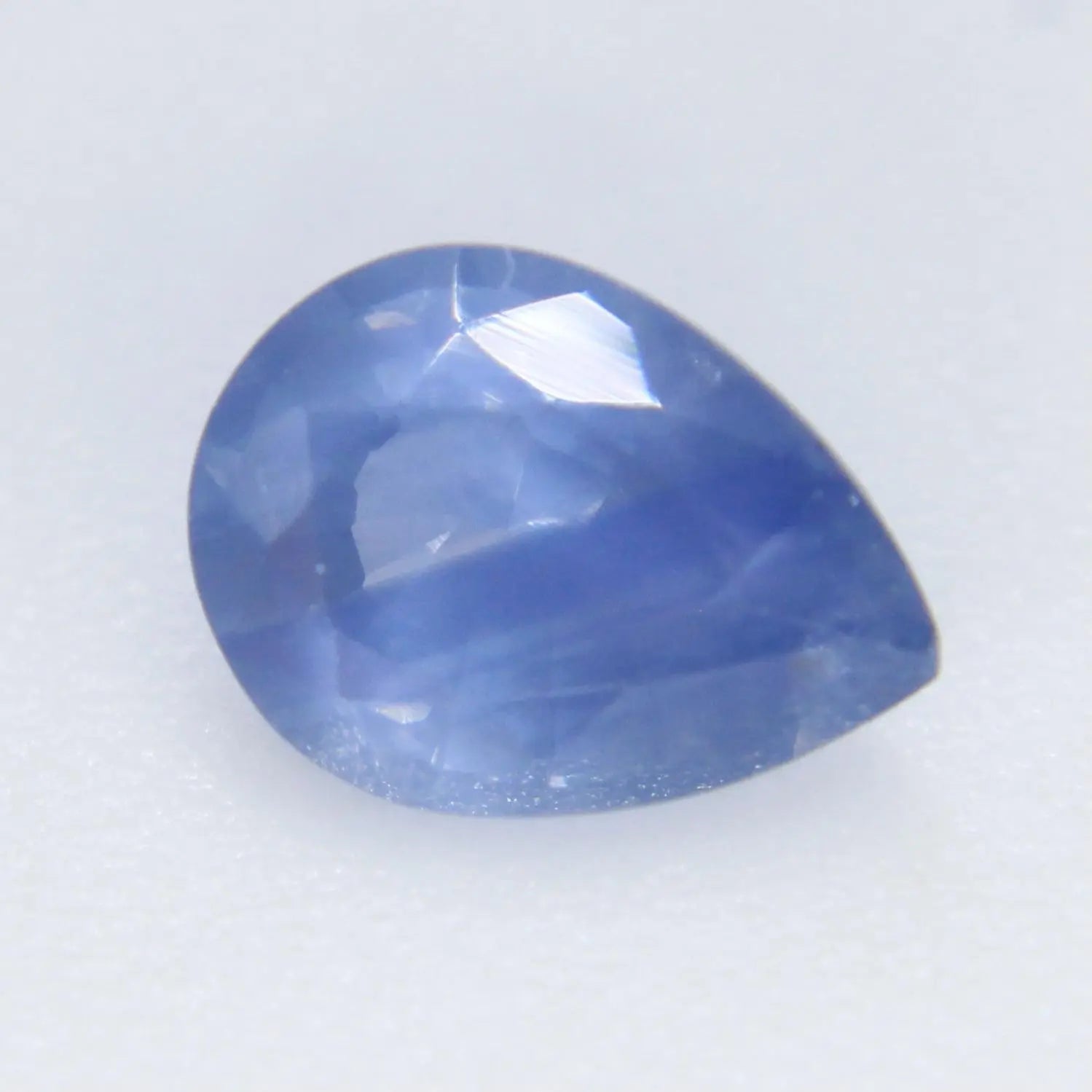 Madagascan blue sapphire pear, faceted gemstone for engagement ring