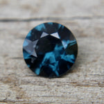 Faceted round bluish green Spinel gemstone for engagement rings