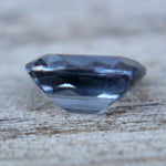Unheated bluish‑purple spinel 0.82 carat cushion stone from Ceylon, eye‑clean clarity