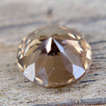 Round cut brown zircon 6.28 × 6.28 × 4.00 mm – eye-clean faceted gem