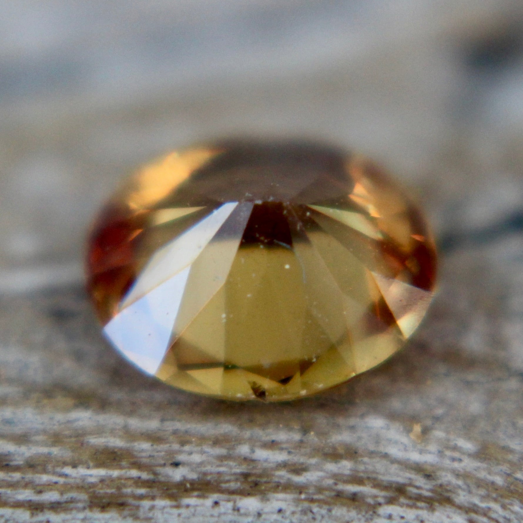 Oval-cut brownish orange sapphire 6.31×5.54 mm VS clarity for engagement rings